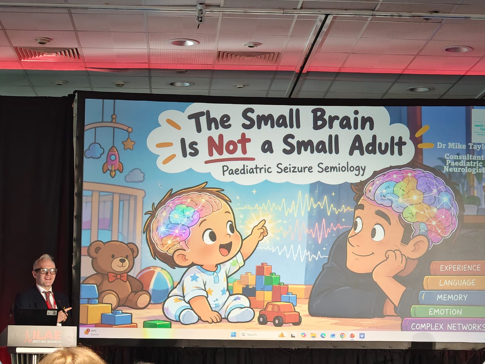 Dr Mike Taylor presenting 'The Small Brain Is Not a Small Adult' on paediatric seizure semiology