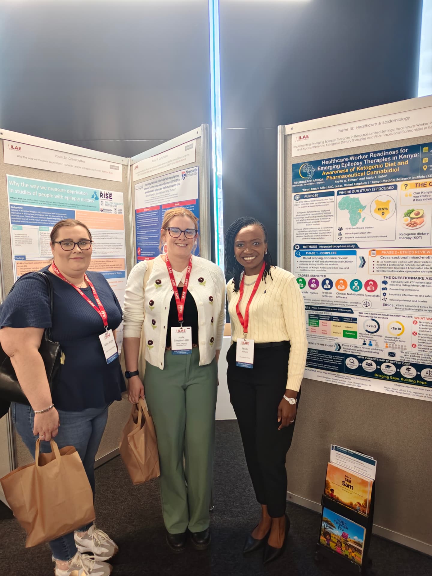 Phyllis with delegates at the poster session